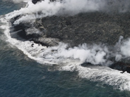 Lava entering ocean, taken from helicopter